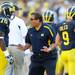 Michigan head coach Brady Hoke instructs defensive tackle Quinton Washington on the sidelines after a play in the second quarter at Michigan Stadium on Saturday. Melanie Maxwell I AnnArbor.com
